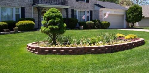 Начинающий клумбы из кирпича. Клумбы из кирпича своими руками: простая работа — отличный результат